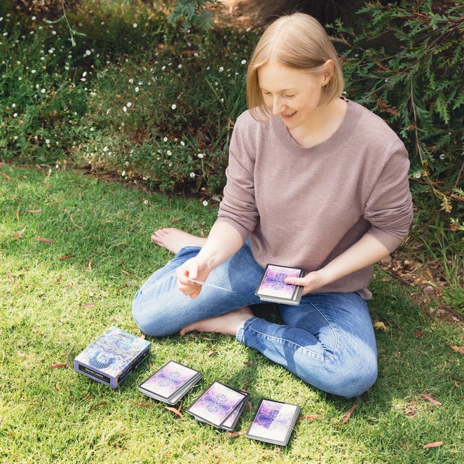 Sarah Jensen working with oracle cards